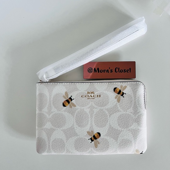 Coach Handbags - Coach Corner Zip Wristlet In Signature Canvas With Bee Print